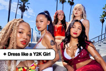 Group of young women in colorful Y2K outfits and crop tops posing by palm trees.