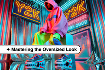 A model wearing oversized Y2K hoodie, neon cargo pants, and chunky platform sneakers in front of a neon-lit background showcasing early-2000s street style
