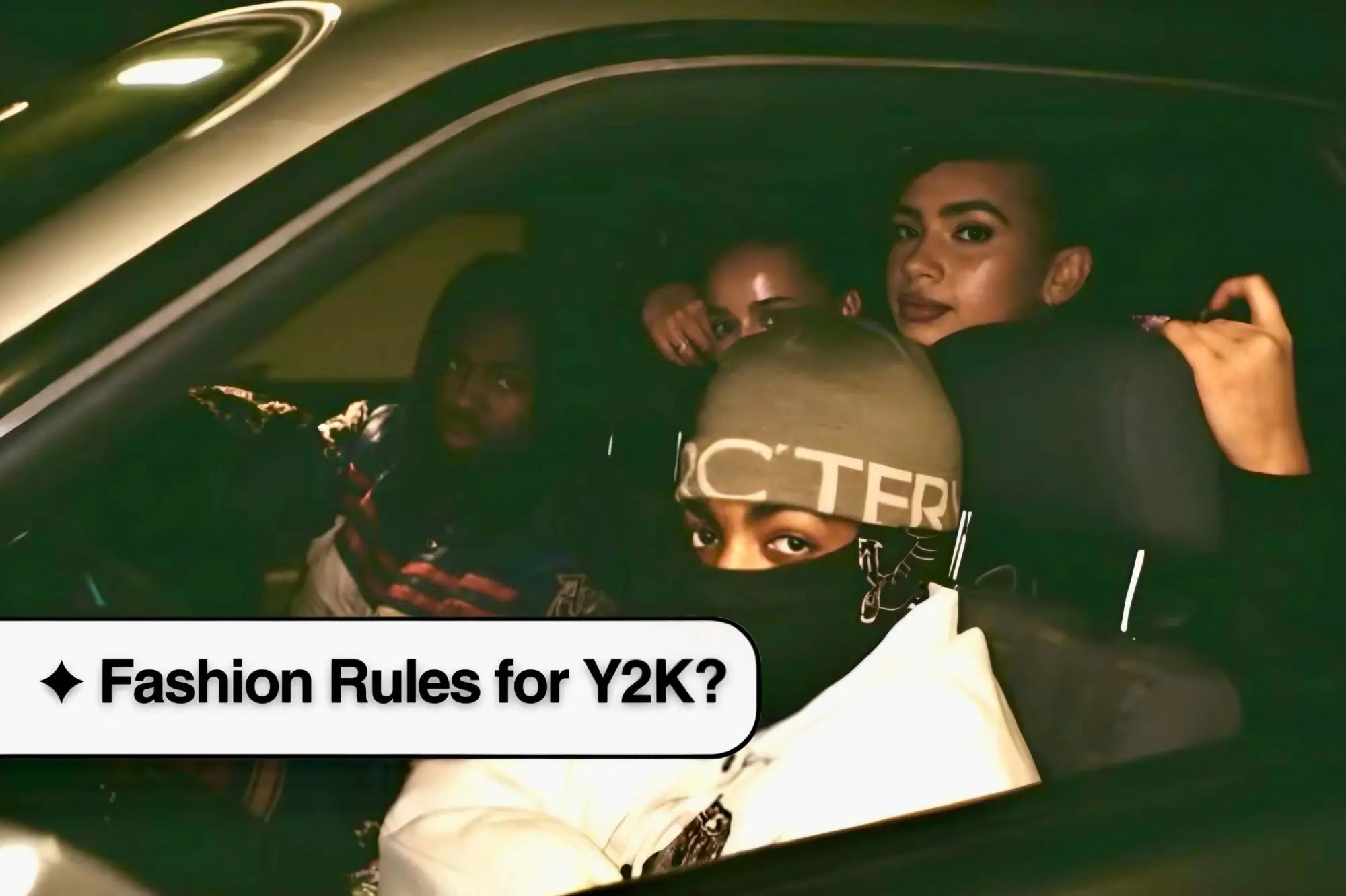 People in a car at night showcasing Y2K fashion with a cap that says CTRFR.