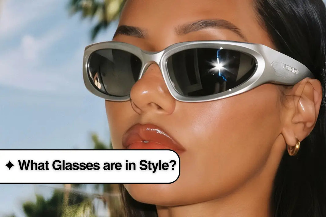 Stylish Y2K sunglasses with white frames and reflective lenses in fashion shoot.