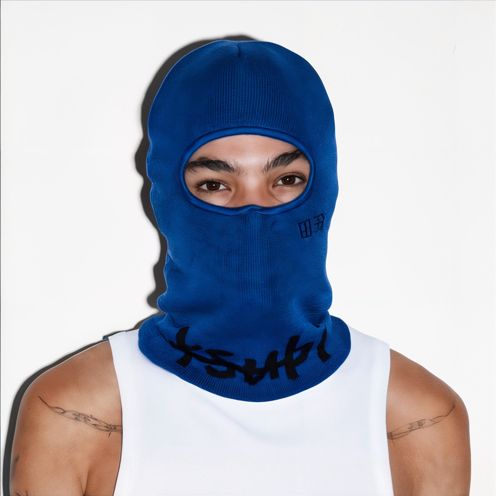 Blue Y2K Balaclava covering head and face, leaving only the eyes visible.