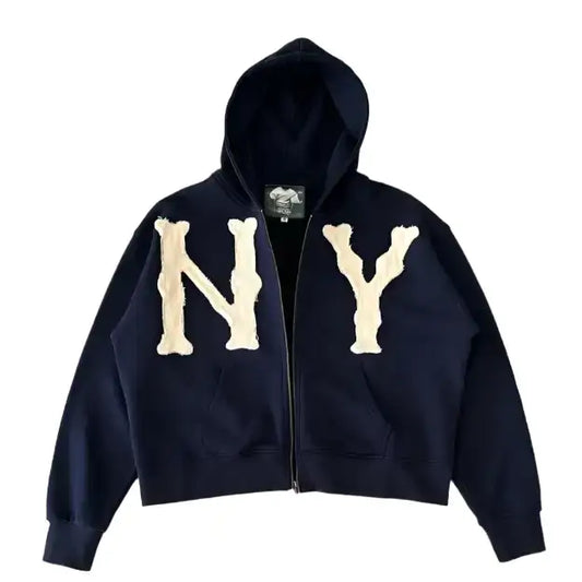 Navy blue 2000s hoodie with cream NY lettering and embroidered design on front