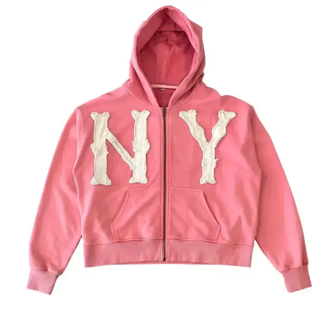 Pink 2000s hoodie with NY appliqué letters and an embroidered design on the front