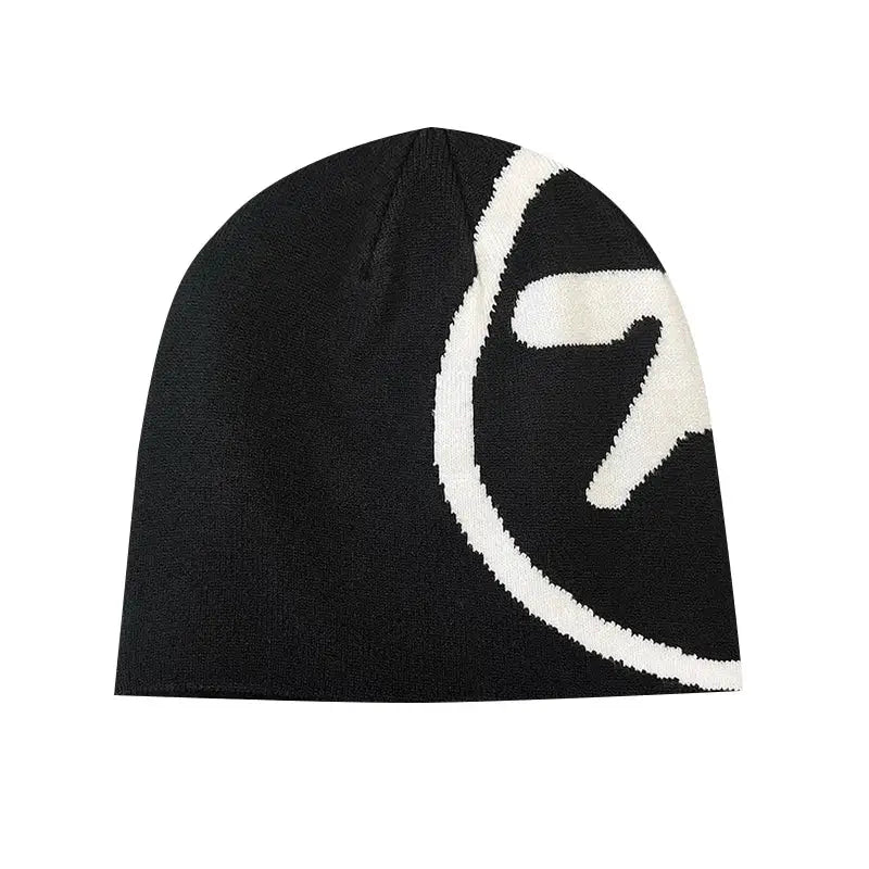 Black knit aesthetic beanie featuring a white abstract design, perfect blend for Y2K style