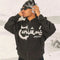 Black Arabic hoodie with crescent moon design and convenient zip-up closure