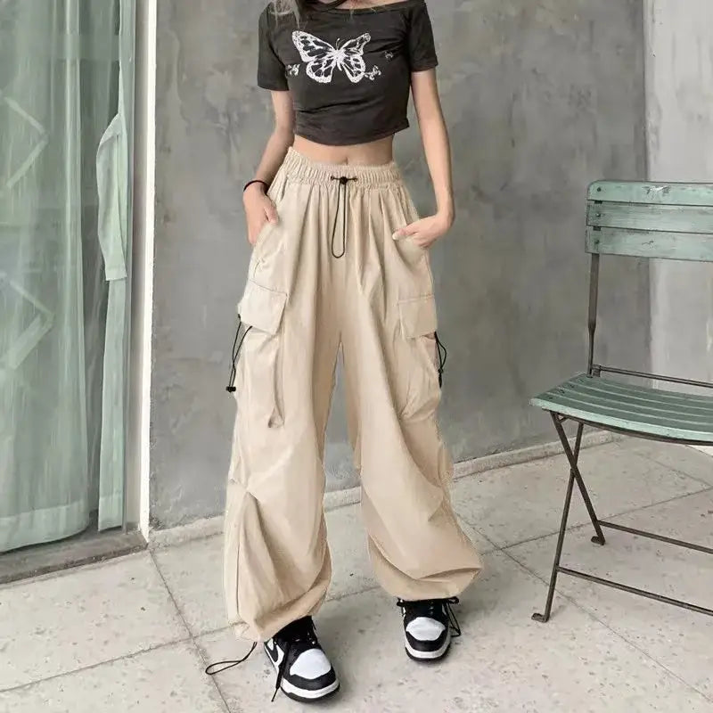 Wide-leg beige cargo pants woman with drawstring waist and side pockets for baggy style