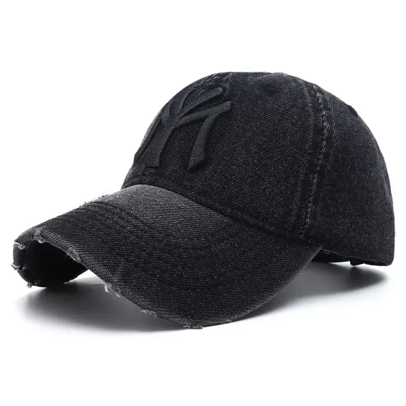 Black distressed baseball cap with embroidered NY logo, perfect for Y2K style enthusiasts