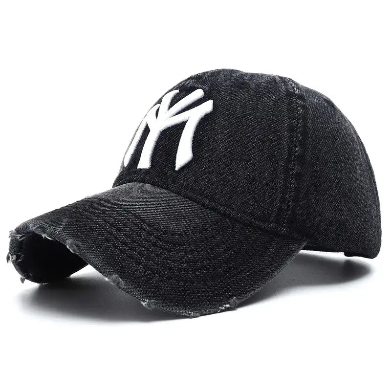 Black baseball cap with white NY logo perfect for Y2K style in the Y2K zone