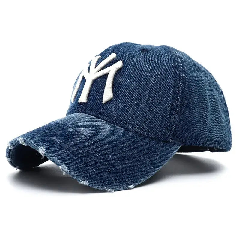 Navy blue baseball cap with worn white NY logo, perfect for Y2K enthusiasts