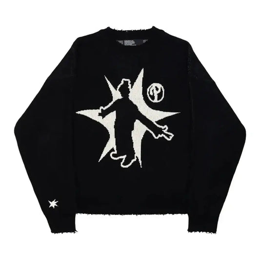 Black knit sweater featuring a white silhouette design on the front