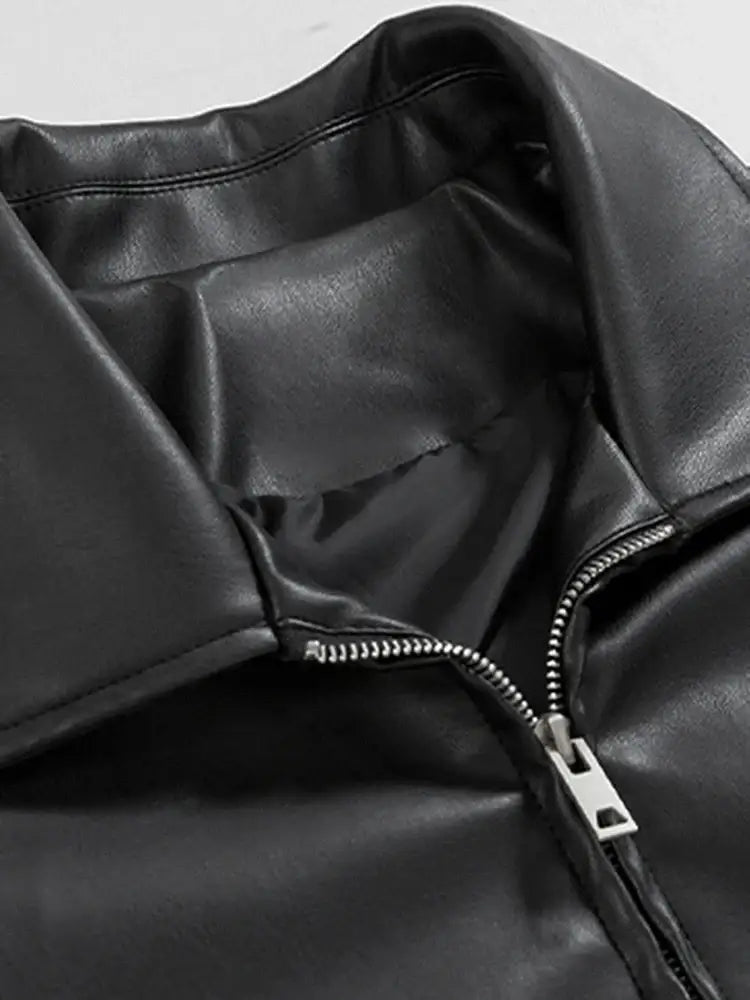 Black leather jacket featuring a prominent zipper detail for a stylish look