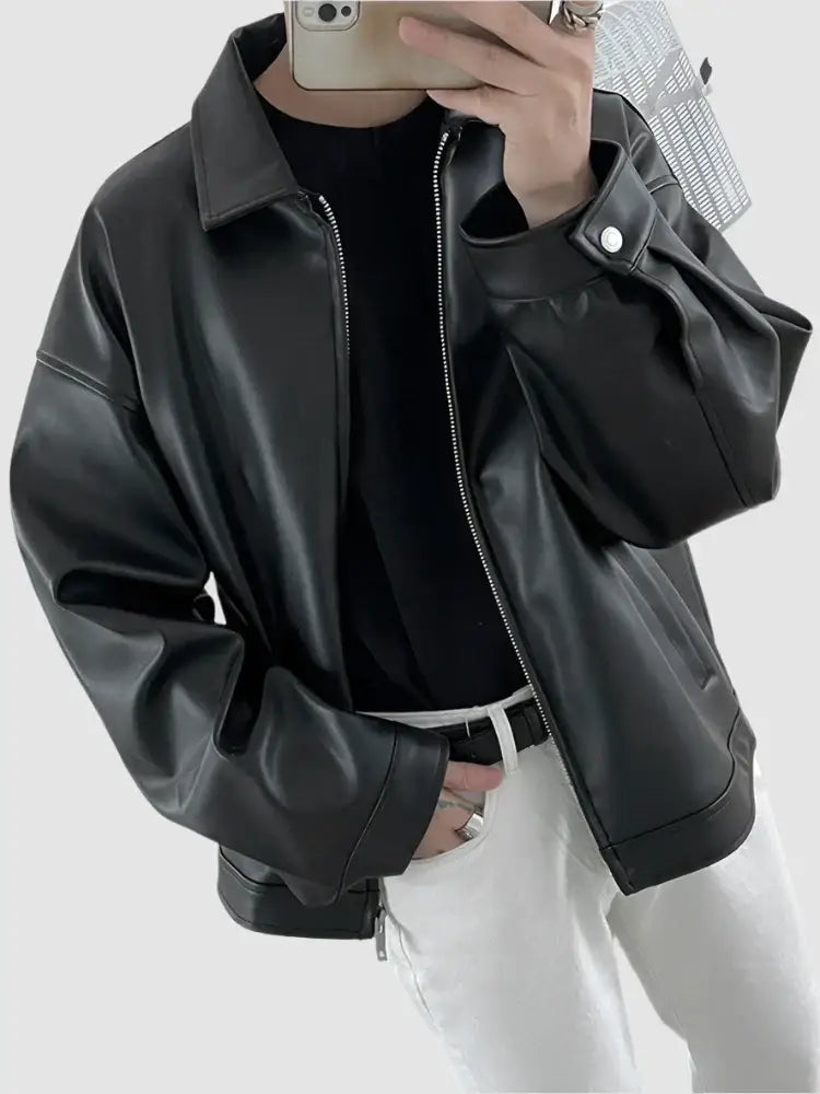 Black leather jacket with collar and zipper front, stylish and versatile outerwear