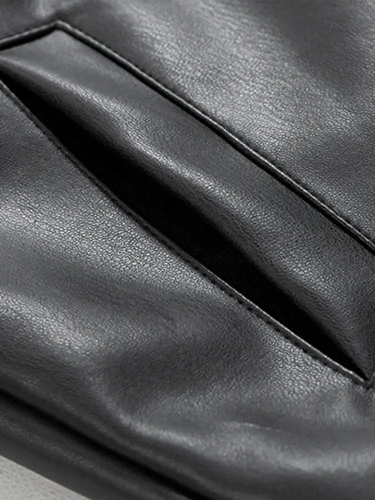 Smooth black leather surface with stitched seam of a stylish Black Leather Jacket