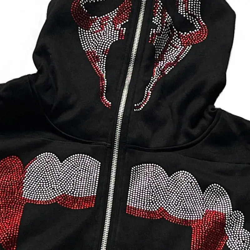 Black rhinestone hoodie featuring a stylish rhinestone bull design on front and hood