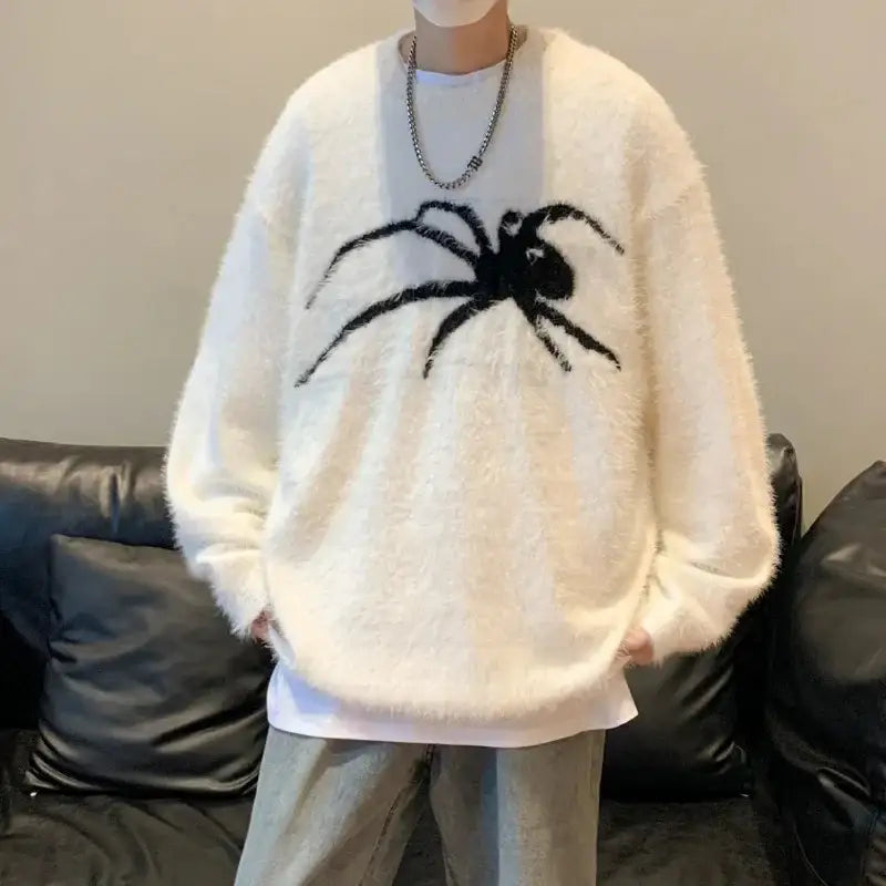 White sweater featuring a black spider graphic, perfect for a stylish black spider sweater