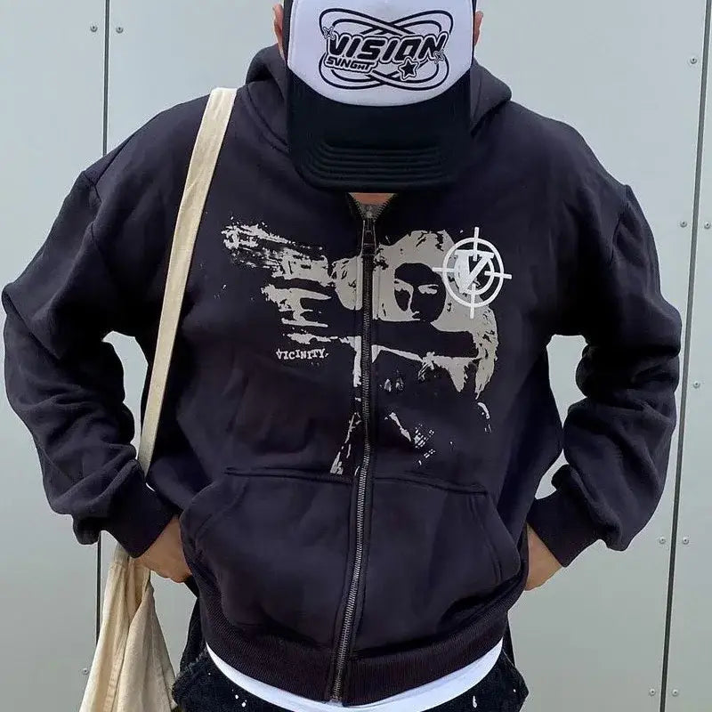 Black Y2K hoodie with graphic design, paired with a white trucker hat, stylish look