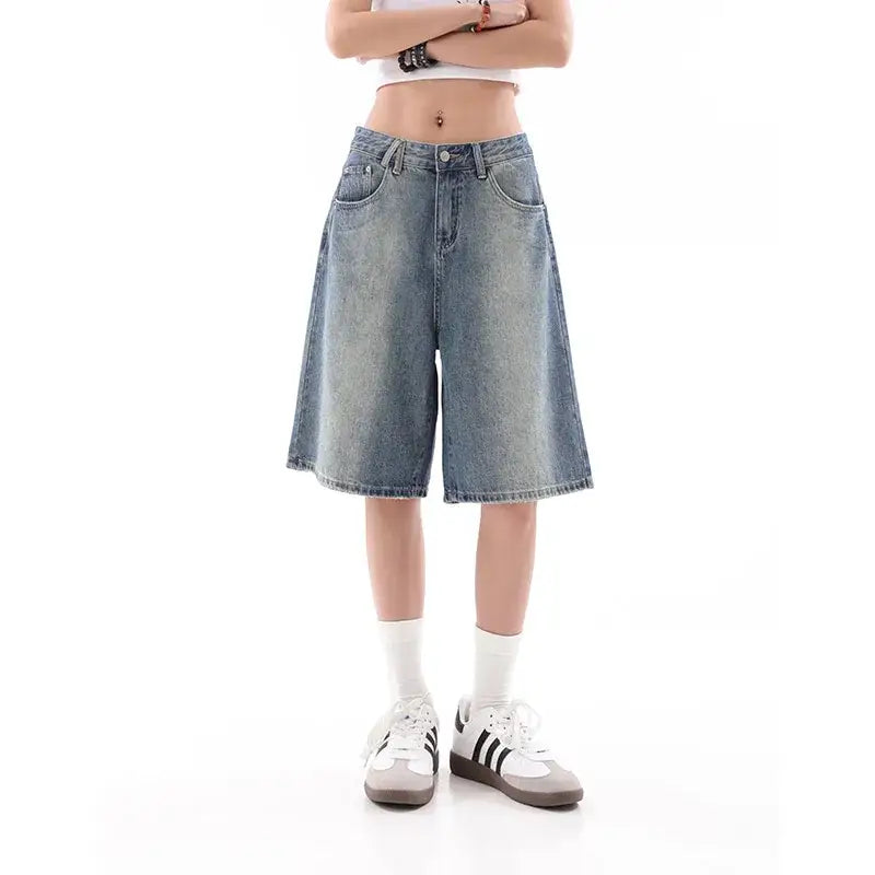 Wide-leg denim shorts in blue jorts style, perfect for a Y2K-inspired look