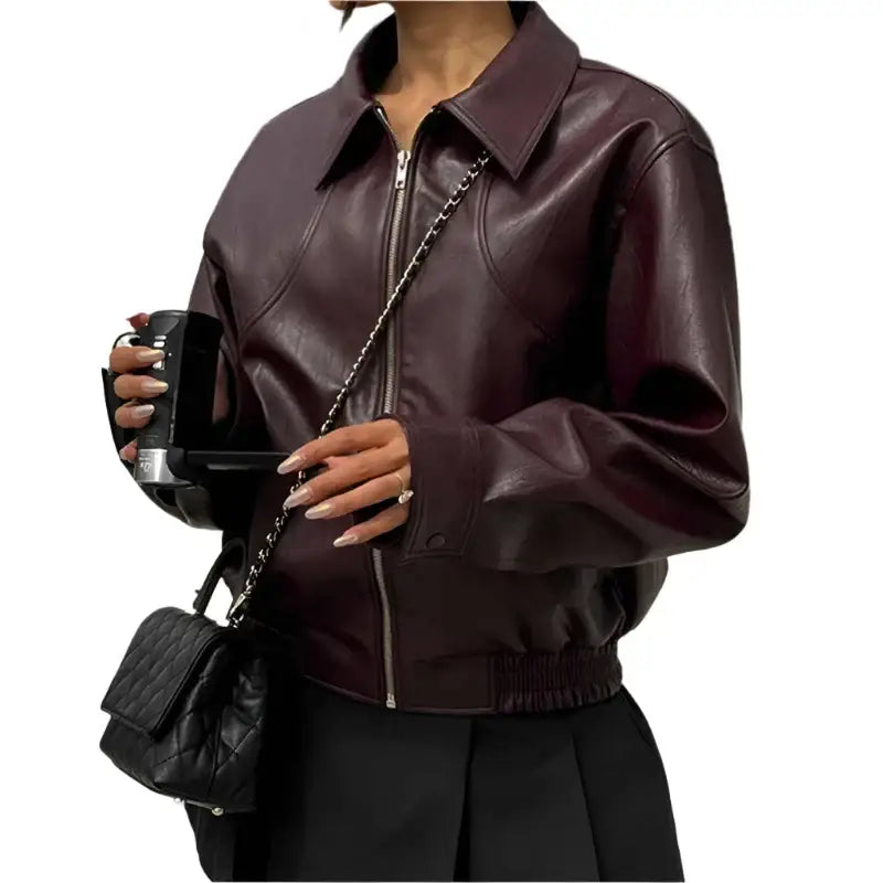 Burgundy leather bomber jacket with collar and zipper, perfect for Y2K fashion