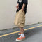 Khaki knee-length cargo shorts with side pockets from Cargo Cargo Shorts collection