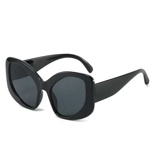 Stylish Cat Eye Sunglasses featuring oversized black frames and dark lenses