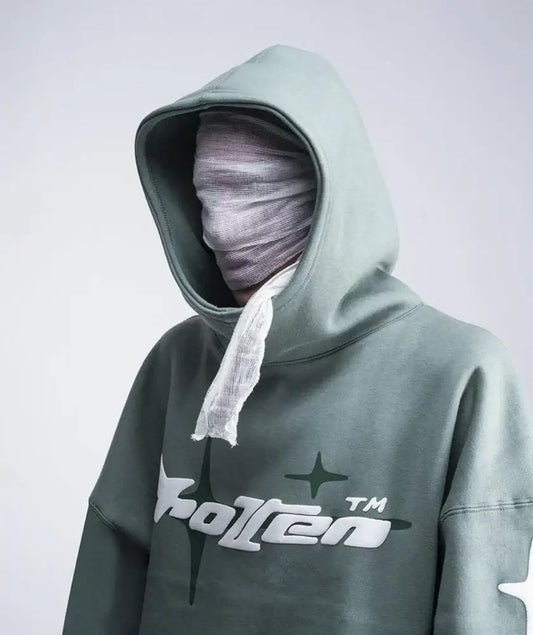 Hooded figure in mint green Cotton Y2K Hoodie with bandaged face for trendy style