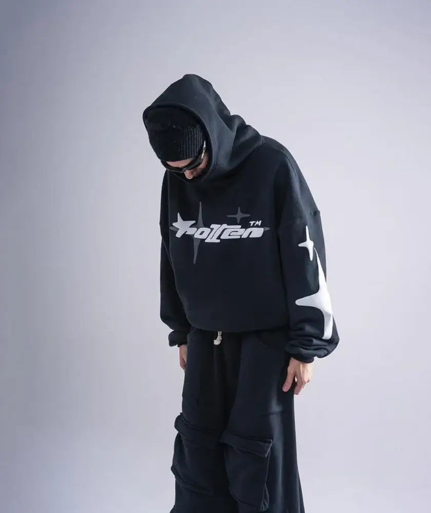 Person in a Cotton Y2K Hoodie featuring bold graphics and a face mask