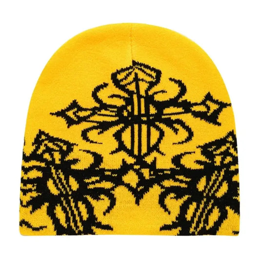 Yellow knit Cross Beanie with black tribal design to stay warm in Y2K style