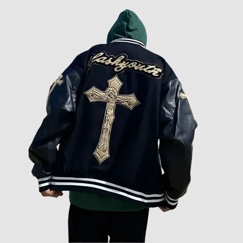 Varsity-style Cross Leather Jacket featuring a large golden cross design on the back