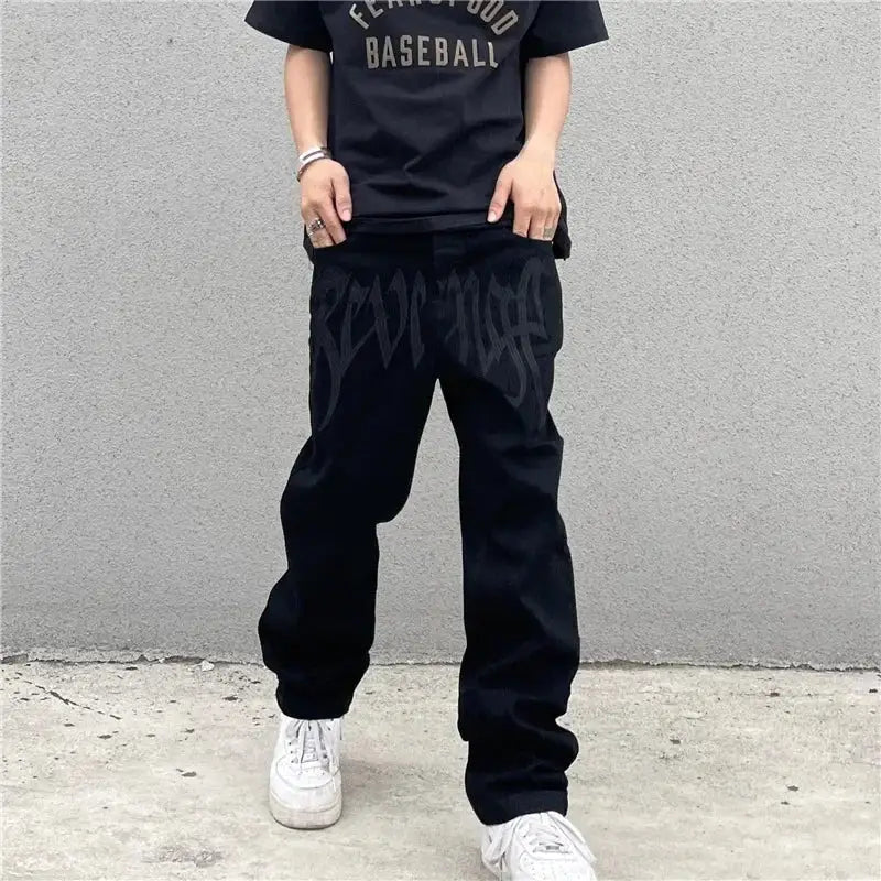 Custom Black Jeans featuring stylish black sweatpants with thigh text design