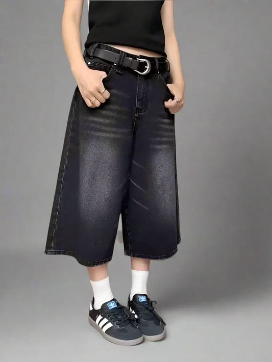 Wide-leg denim culottes with a black belt for stylish dark denim shorts