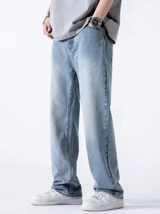 Light blue loose-fitting jeans with straight leg cut perfect for dark washed denim styles