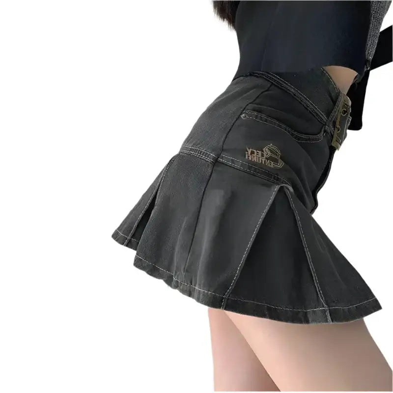 Black denim mini skirt Y2K with pleats and a stylish visible pocket