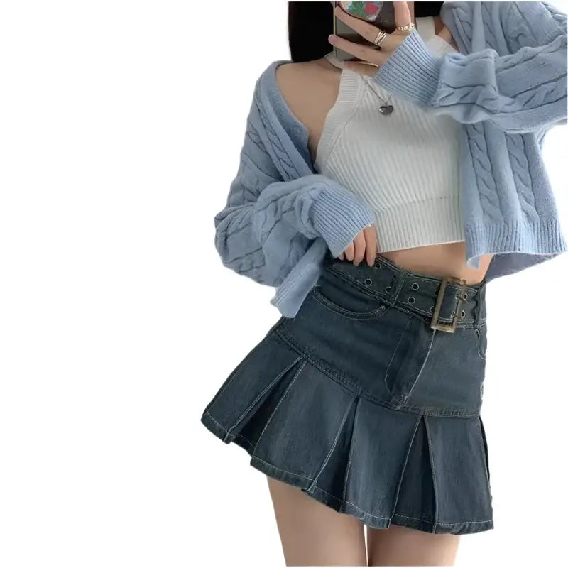 Pleated denim mini skirt with wide belt, perfect for Y2K style enthusiasts