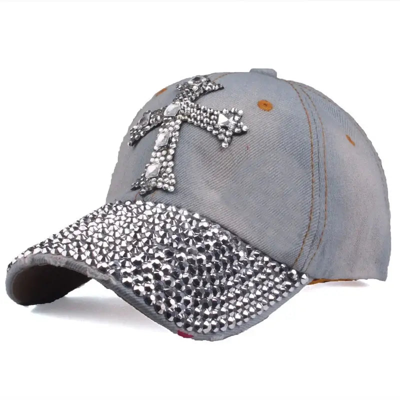 Gray denim baseball cap featuring rhinestones and a stylish cross design