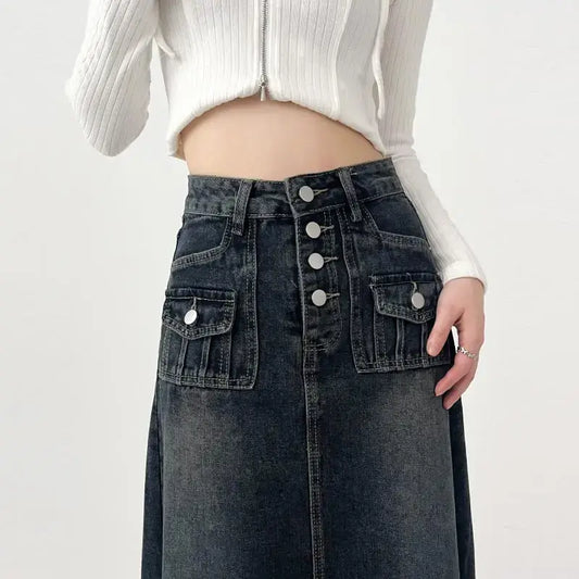 Dark denim cargo maxi skirt featuring a button-up front and stylish cargo pockets