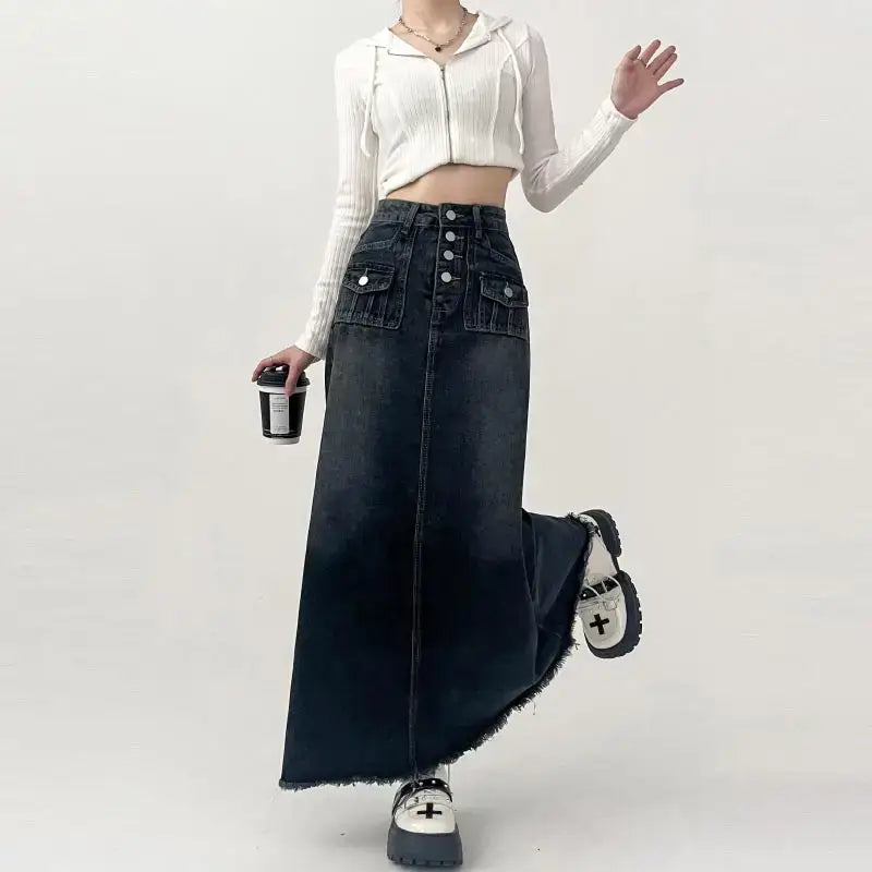 Long black denim cargo maxi skirt with front pockets and stylish button detailing