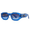 Pair of blue designer sunglasses with gold accents and gradient lenses, perfect y2k style