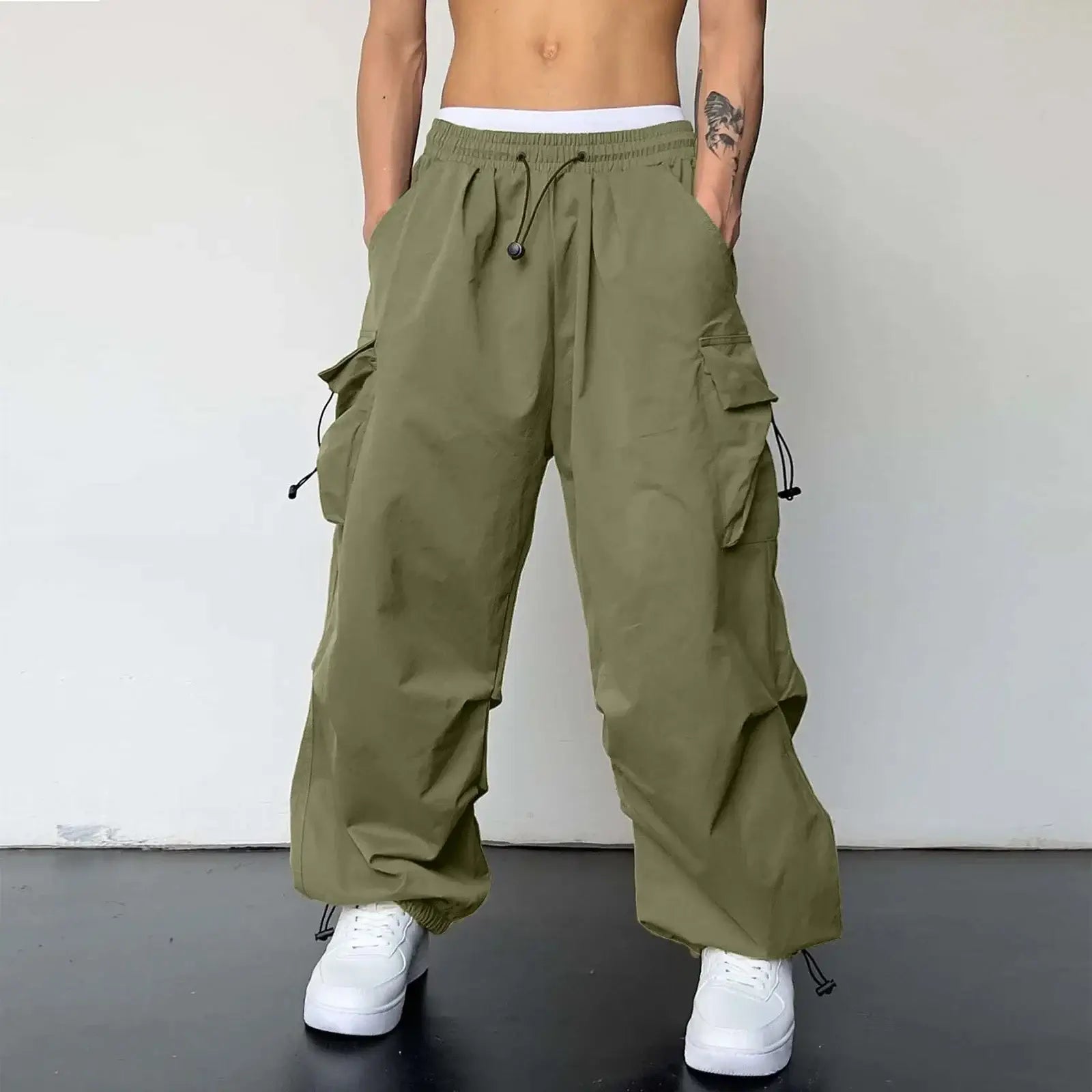 Olive green drawstring cargo pants with side pockets and adjustable waist