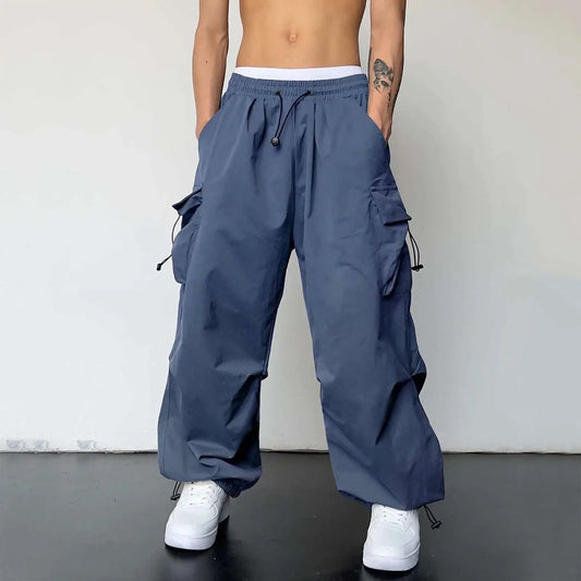 Blue wide-leg drawstring cargo pants featuring a waist and side pockets for style