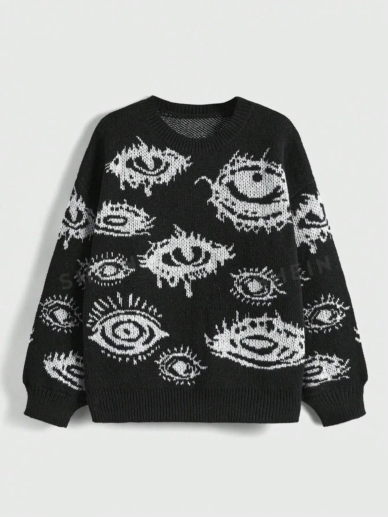 Black Evil Eye Sweater featuring white eye designs knitted into the fabric