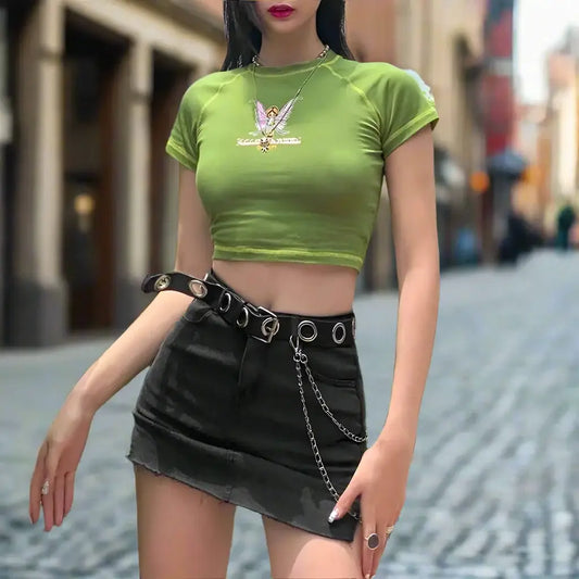 Woman in a bright green Fairy Crop Top and black mini skirt with chain belt