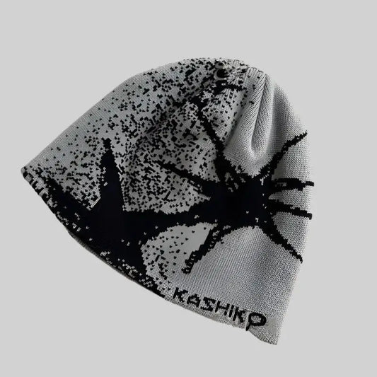 Gray knit fashion beanie featuring a black spider design to stay warm in style