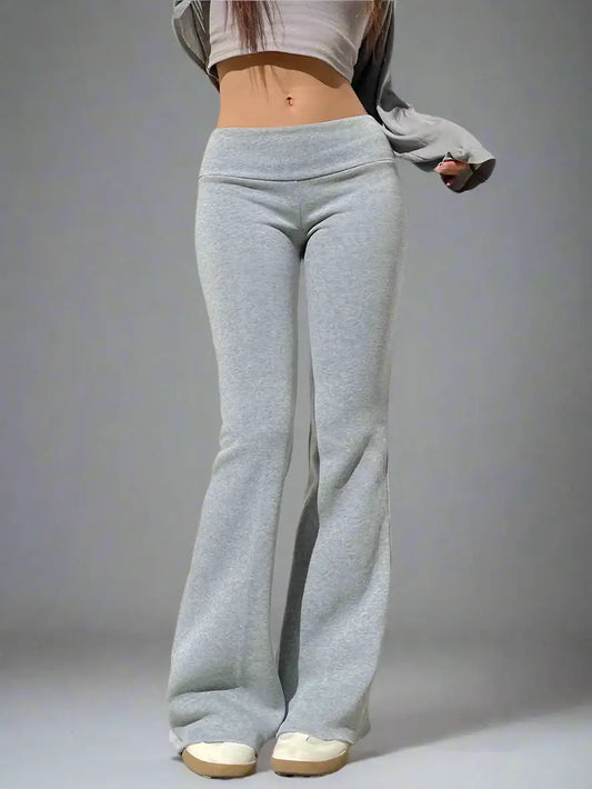 Light gray flared yoga pants showcasing stylish flare leggings for a Y2K look