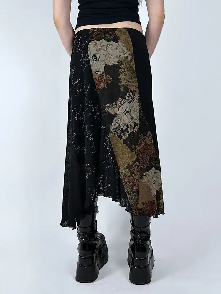 Asymmetrical black Floral Midi Skirt featuring an abstract patterned panel