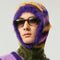 Person wearing a fluffy hat in vibrant purple and yellow, size 56-58cm, Y2K style