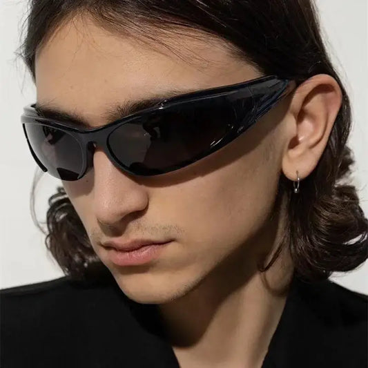 Sleek black wraparound Futuristic Sunglasses for eye protection in a Y2K style