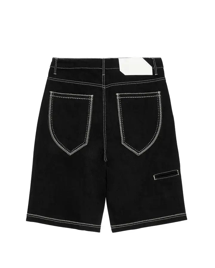 Black denim Graffiti Shorts featuring contrasting white stitching and back pockets