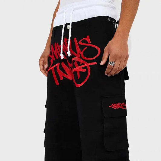 Black Graphic Pants featuring bold red graffiti-style text for trendy womens Y2K clothing