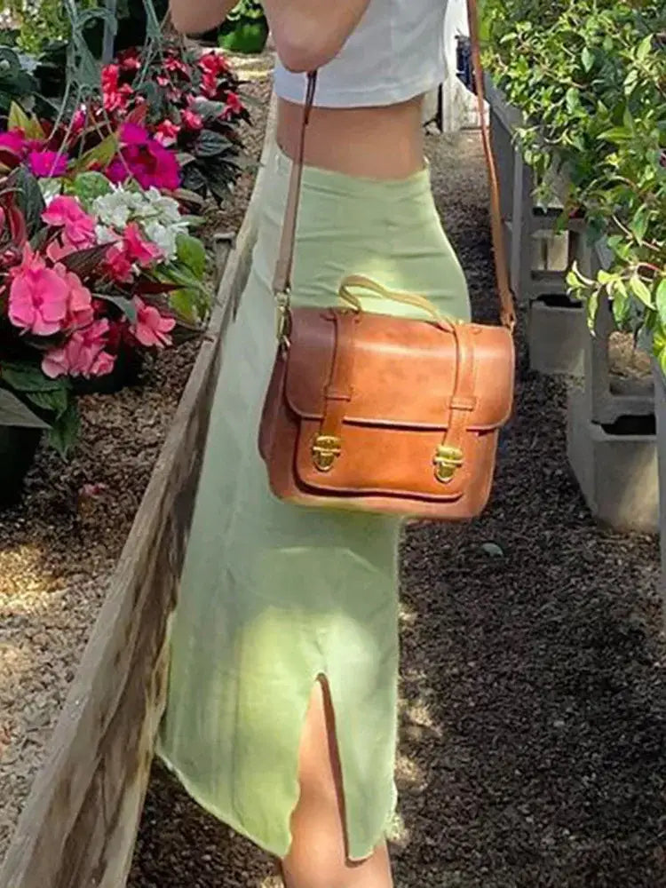 Light green midi skirt with a side slit for a stylish and comfortable look