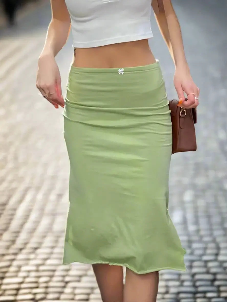 Light green fitted midi skirt with a slight flare, perfect for stylish outfits